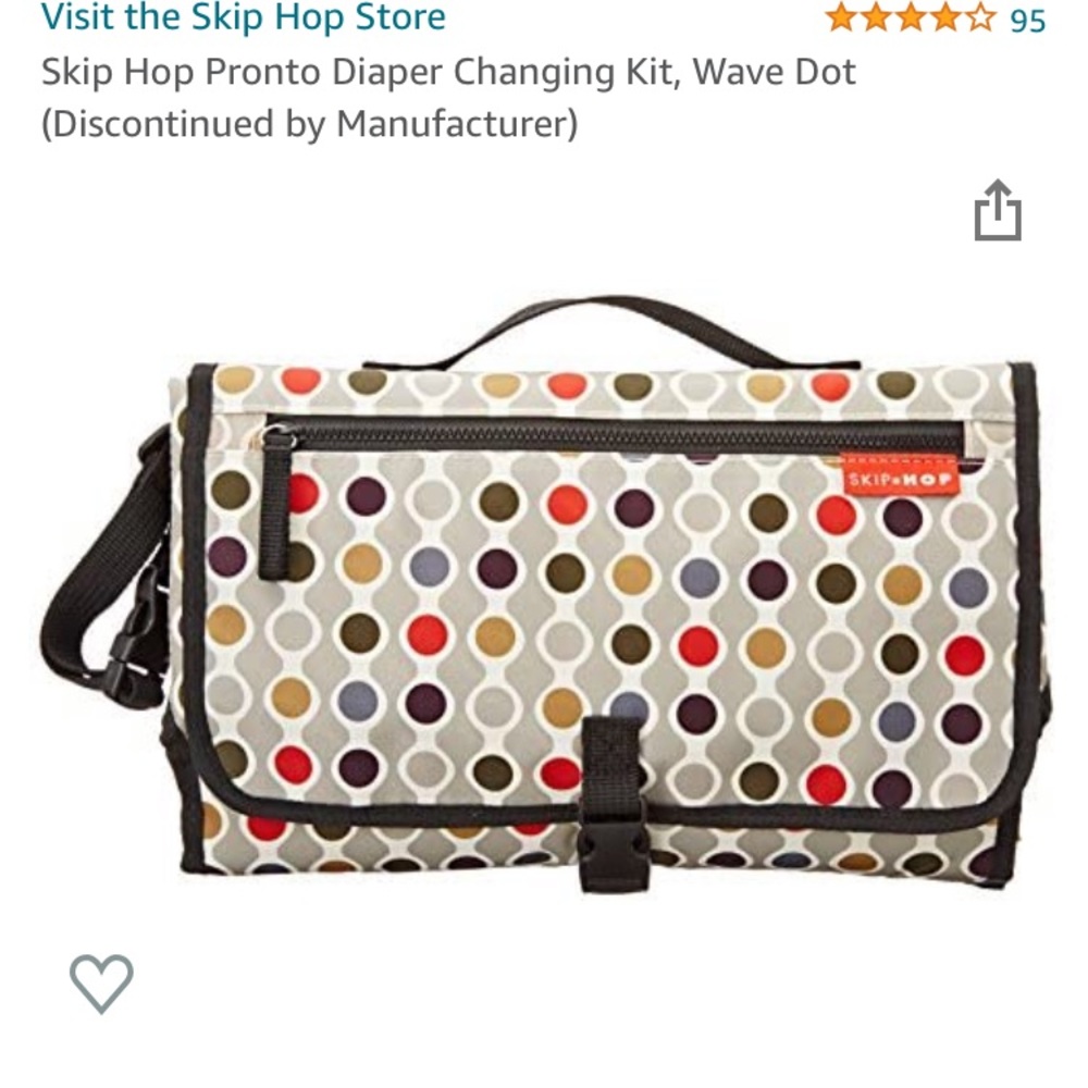 EUC Skip Hop “Pronto” changing station in multicolor Wave Dot pattern.